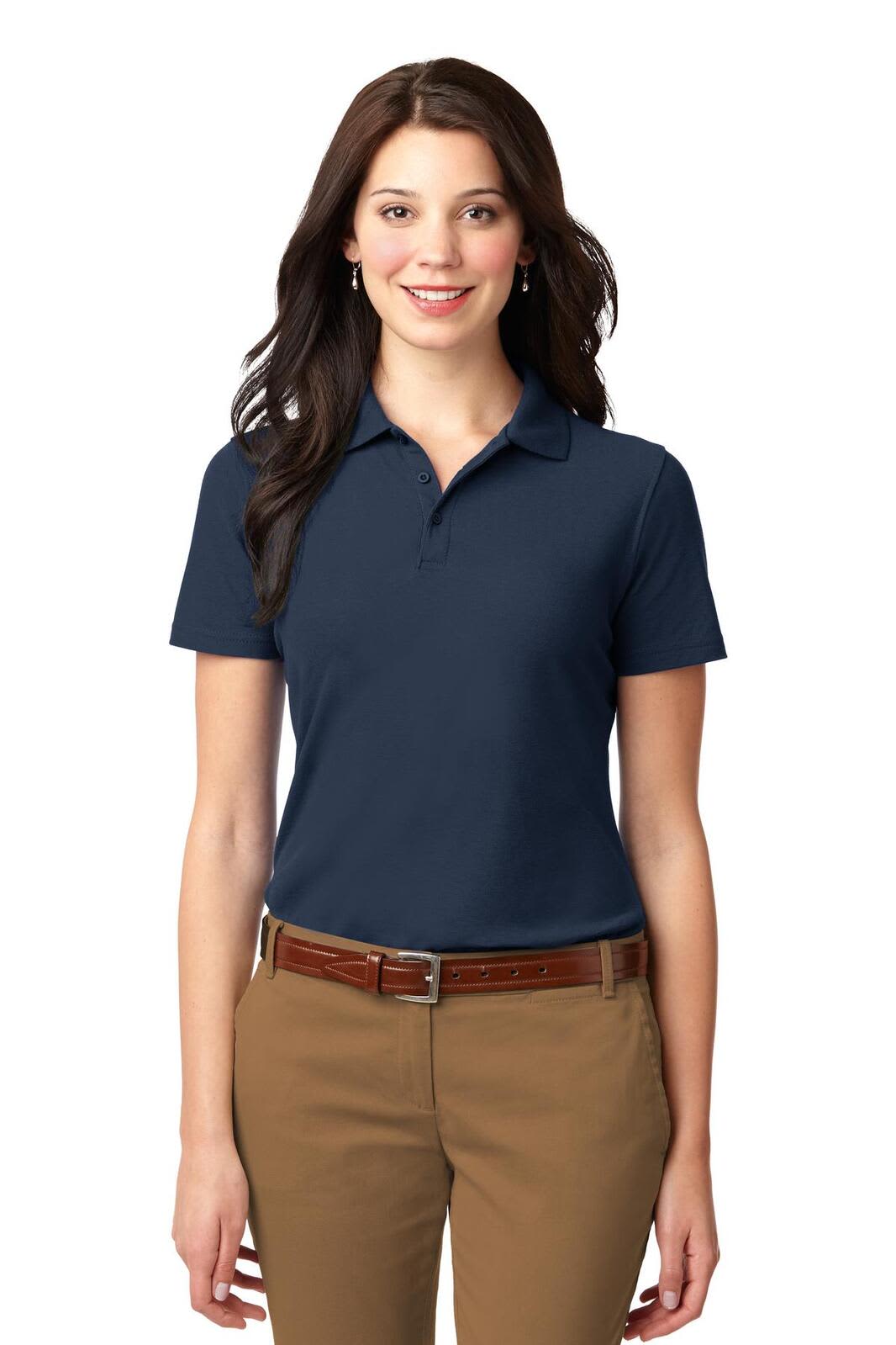 A navy blue ladies polo shirt with a collar, featuring short sleeves and a discreet logo.