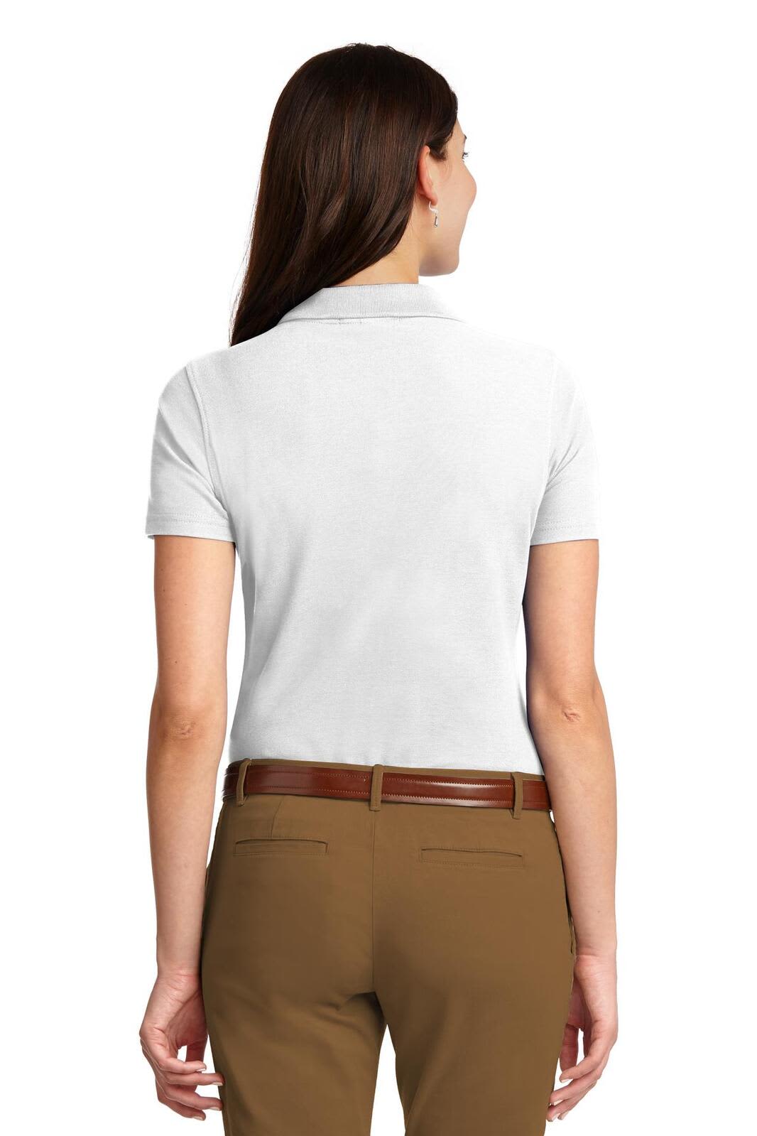 A light grey ladies' polo shirt with a short sleeve and a collar, featuring a logo on the back.