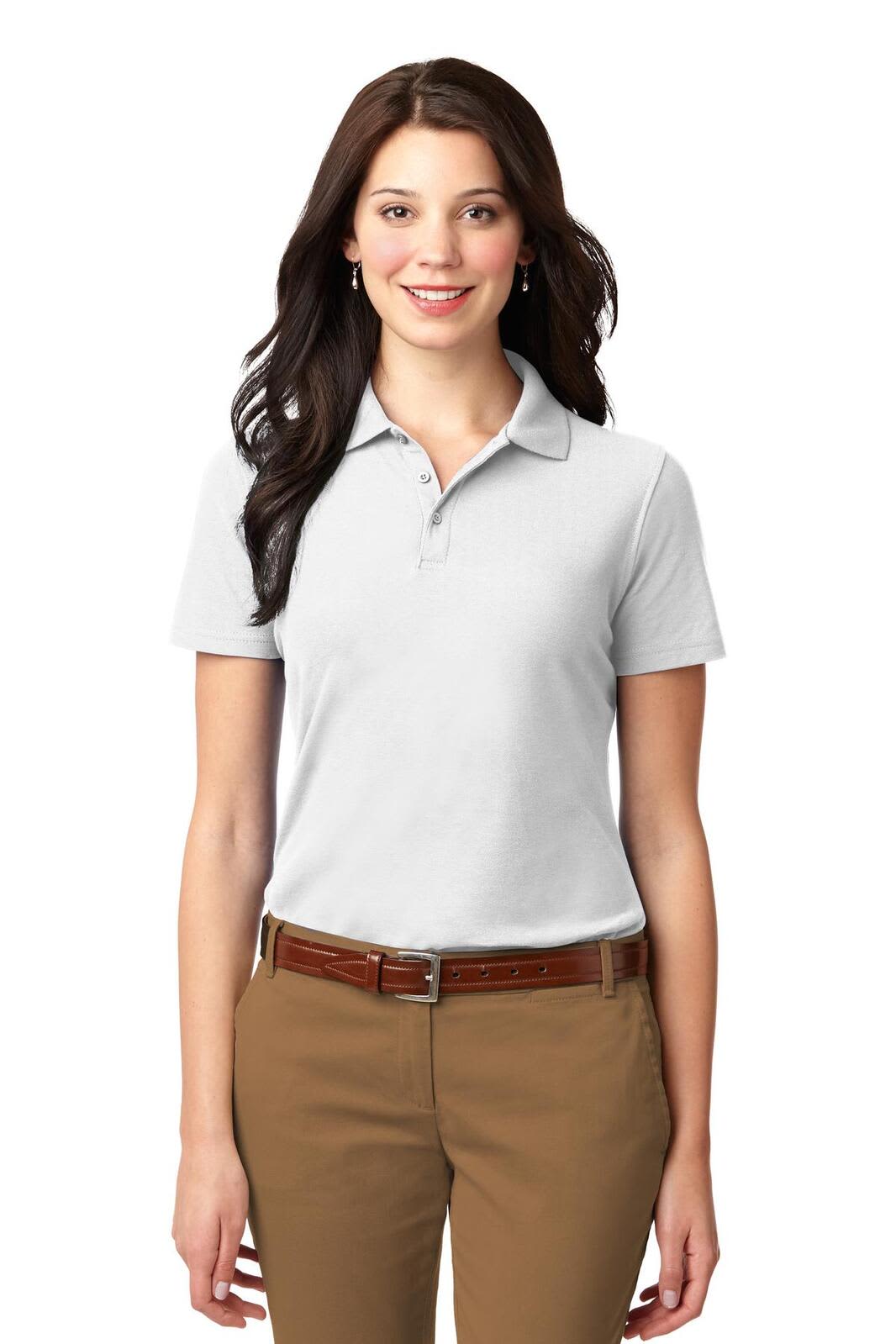 A light grey ladies' polo shirt with a collar, featuring a logo, worn with tan trousers.