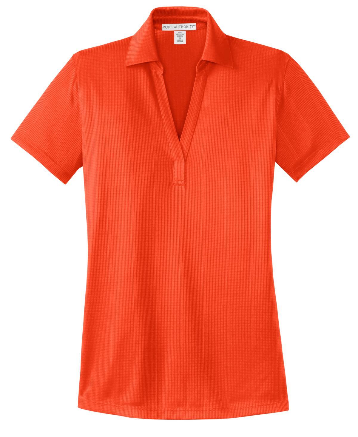 An orange women's polo shirt with a fine jacquard texture and a collar, featuring a logo.