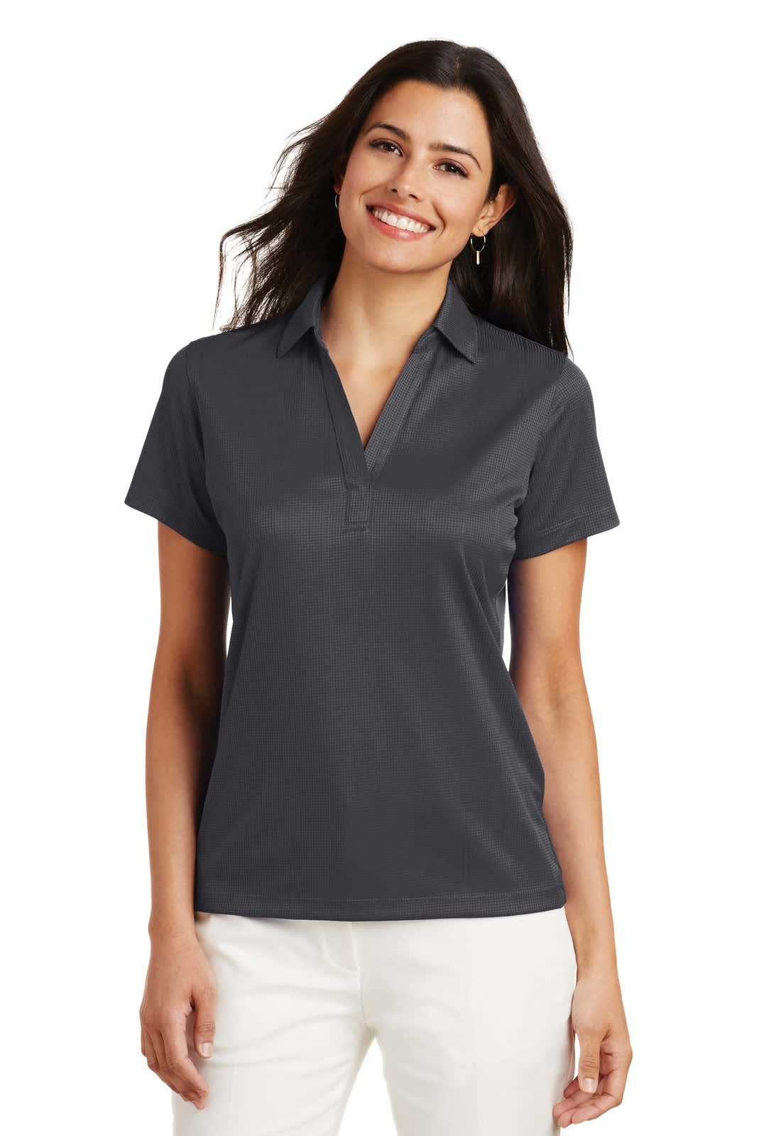 A dark grey polo shirt with a collar and short sleeves, modelled by a woman. The shirt features a logo.