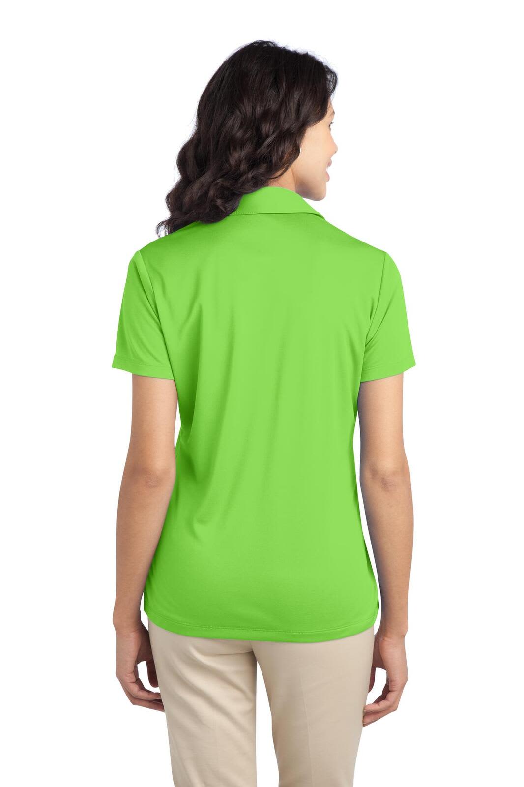 A back view of a women's short-sleeve polo shirt in bright green, featuring a collar and a logo.