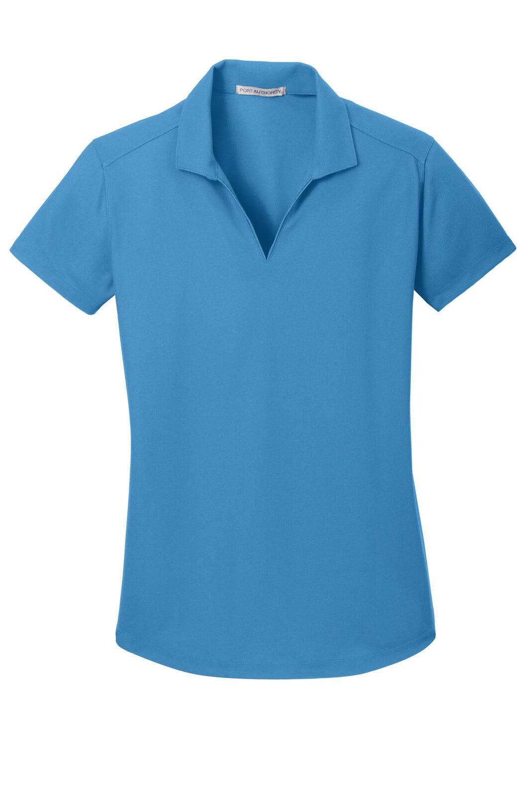 A blue women's polo shirt with a collar and short sleeves, featuring a logo on the left side.