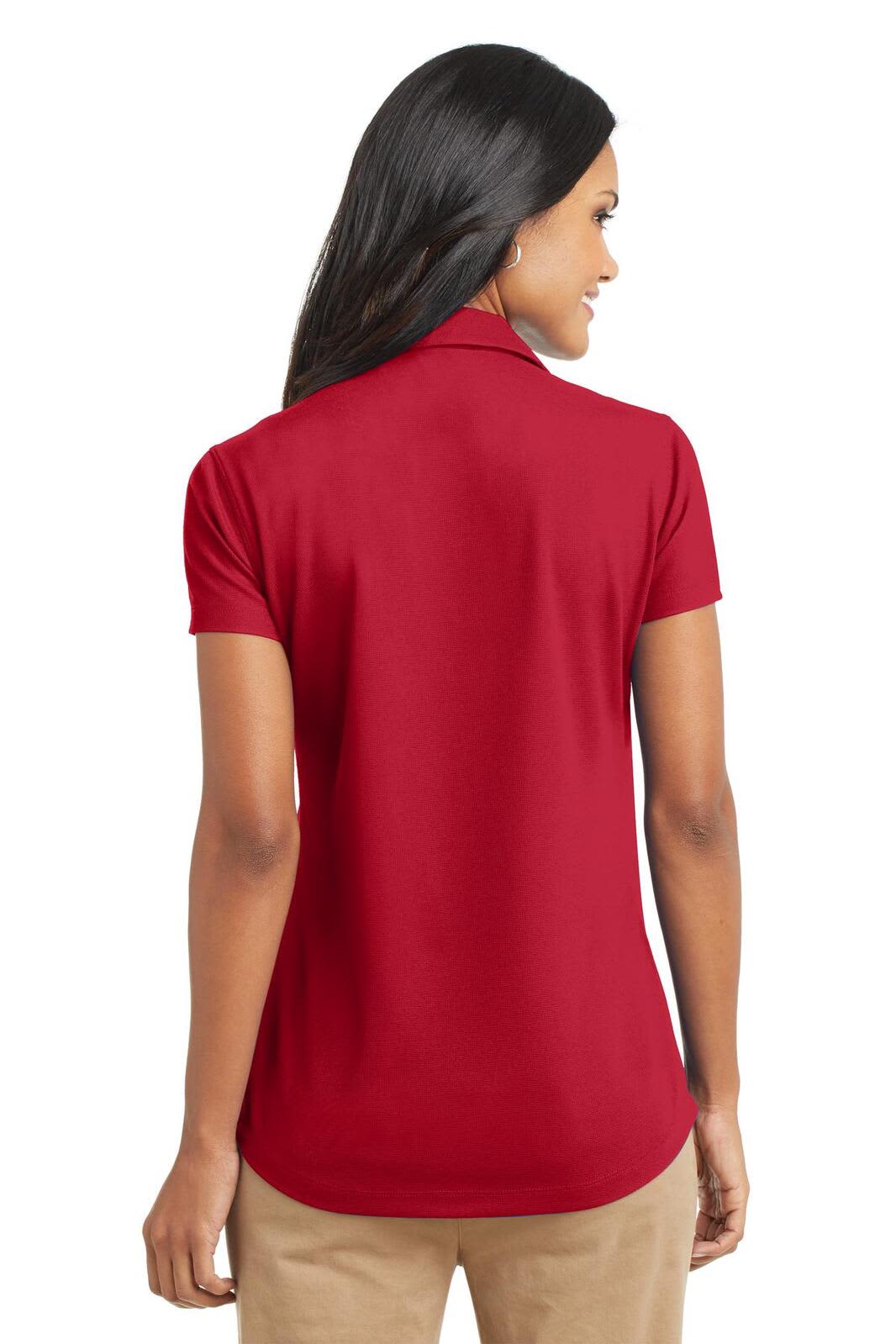 A red ladies' polo shirt with a collar and short sleeves, featuring a logo on the back.
