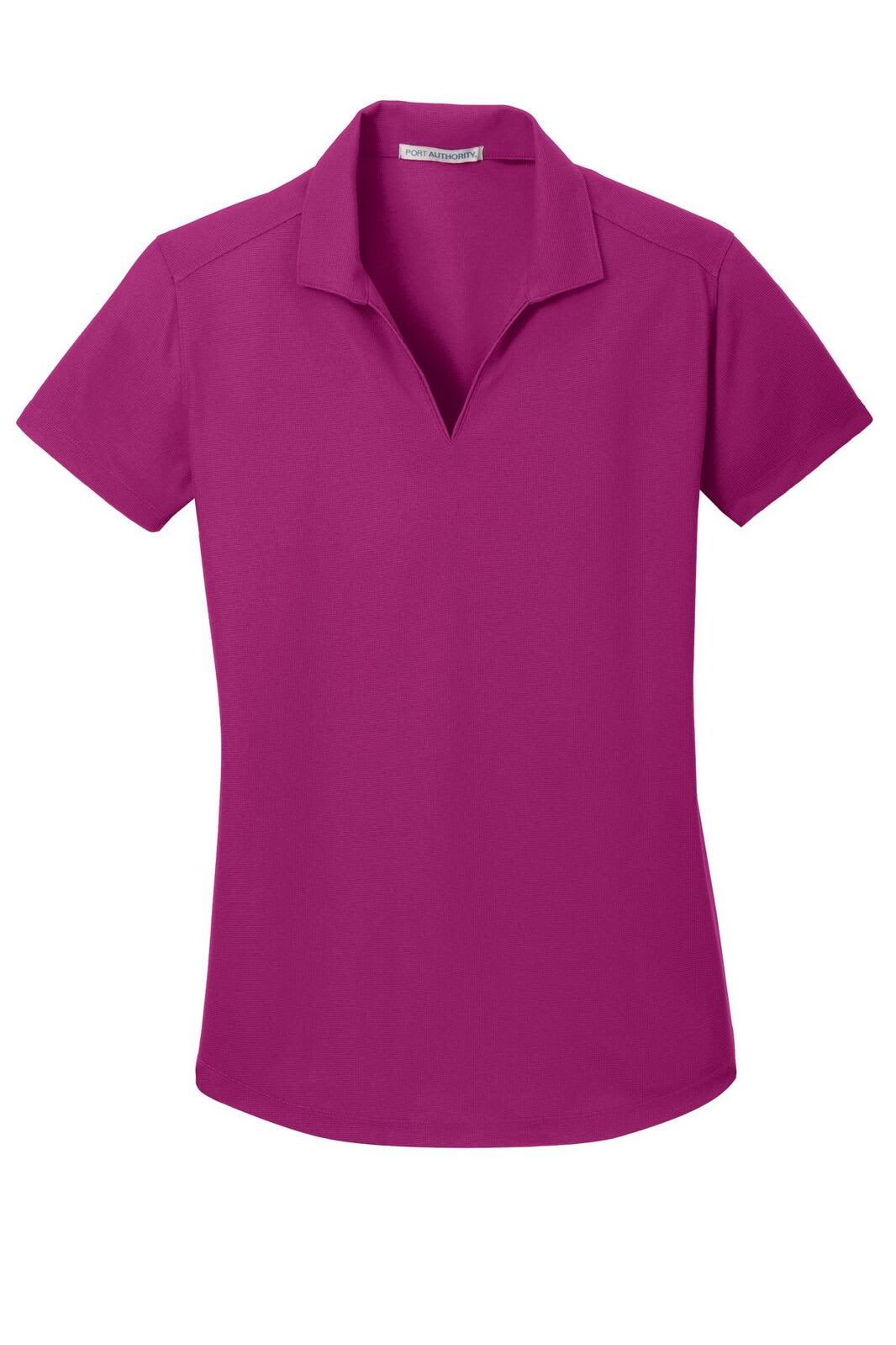 A women's polo shirt in a vibrant magenta colour with a collar and short sleeves. It features a small logo.