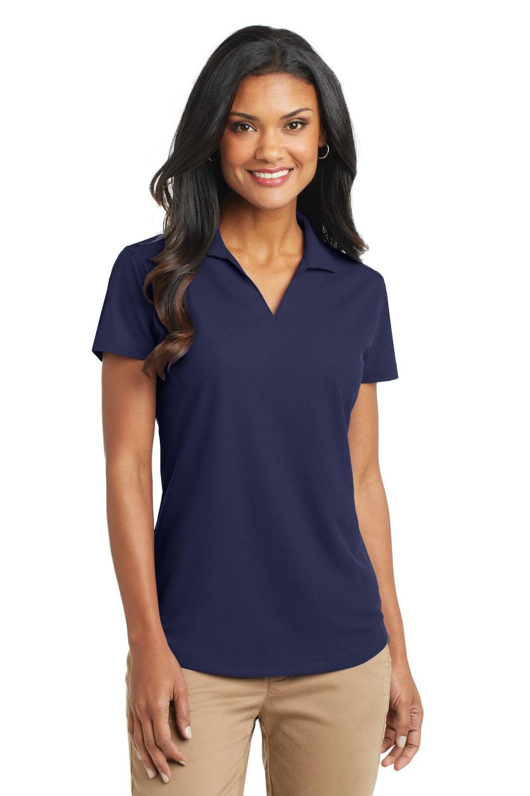 A navy blue ladies polo shirt with a short sleeve design and a collar. It features a logo.