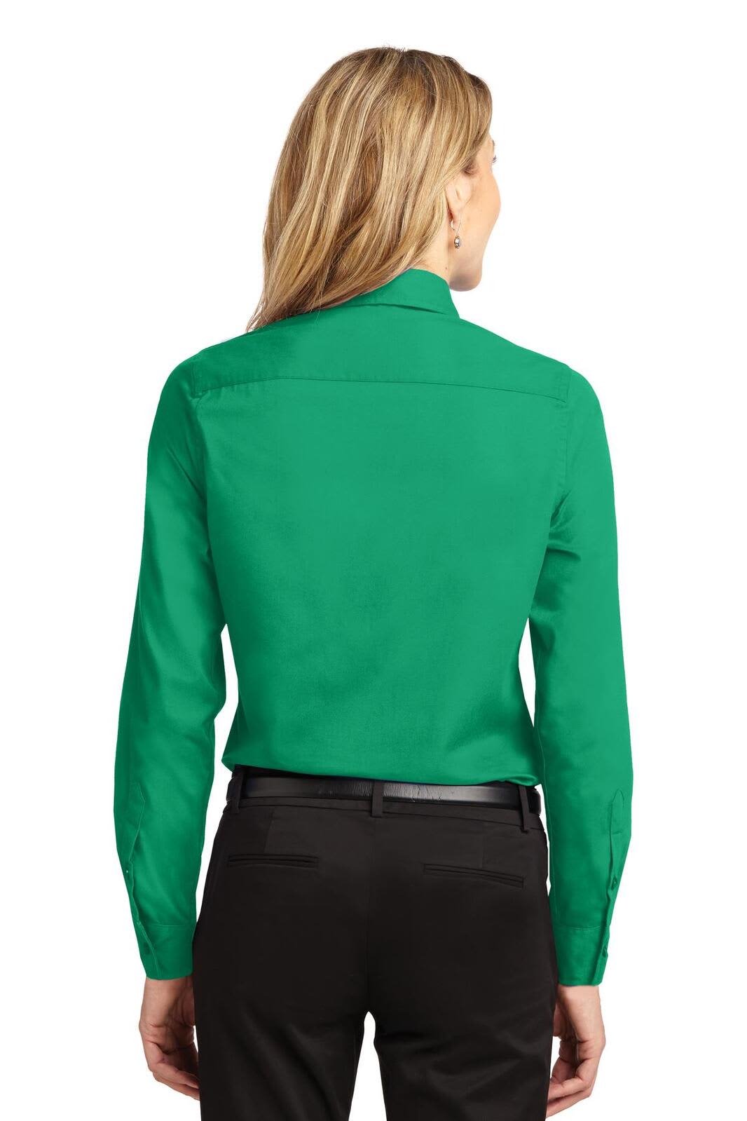 A green long sleeve button-up shirt with a collar, featuring a back yoke and fitted silhouette.