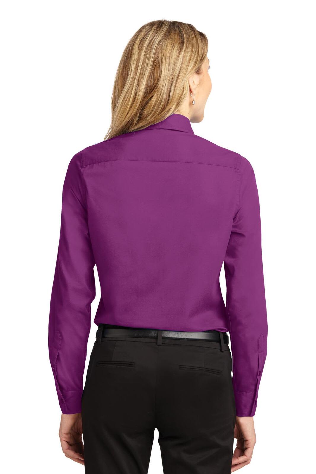 A purple long sleeve button-up shirt with a collar and a logo on the back.