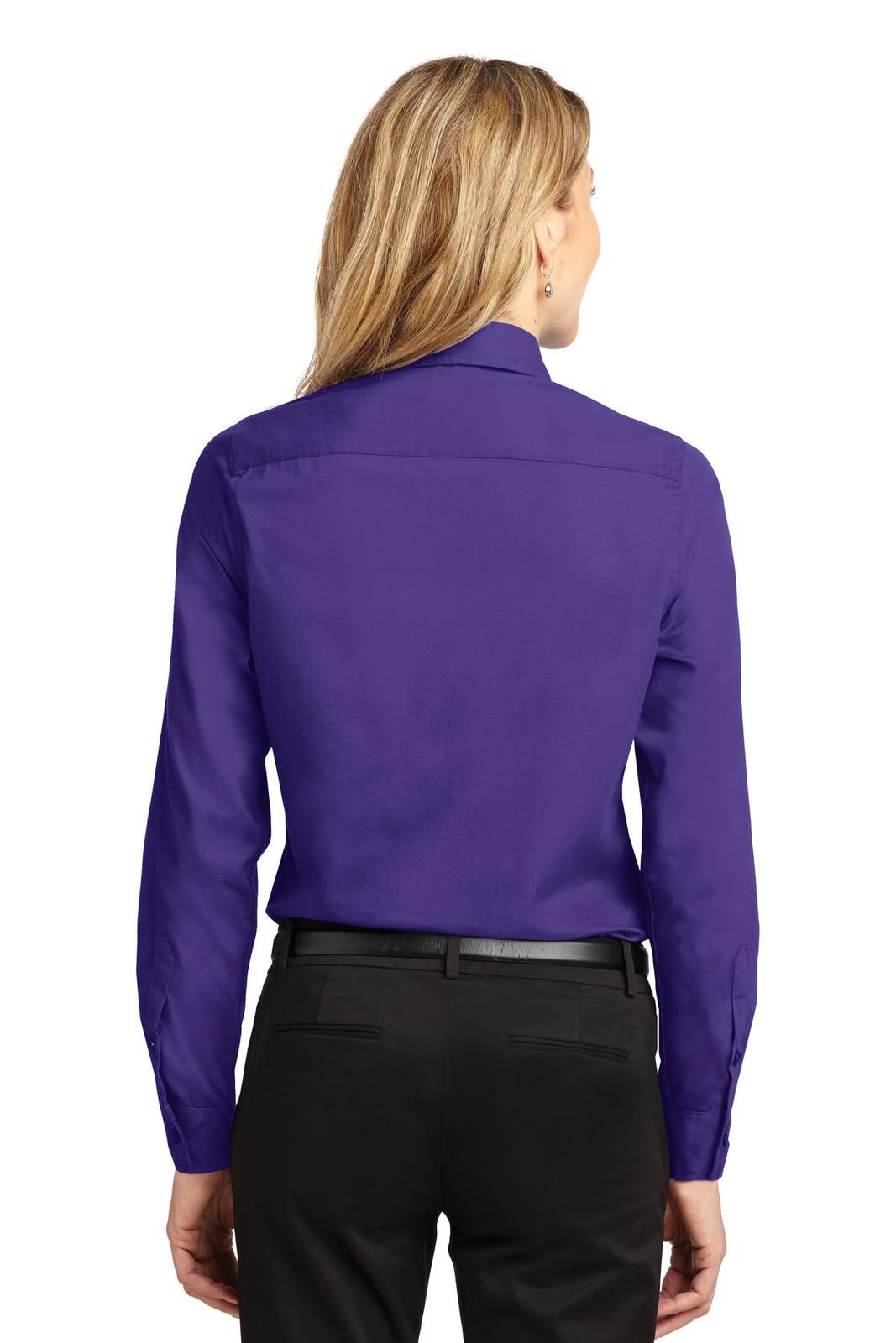A purple long sleeve button-up shirt with a collar, displayed from the back view, featuring a logo.