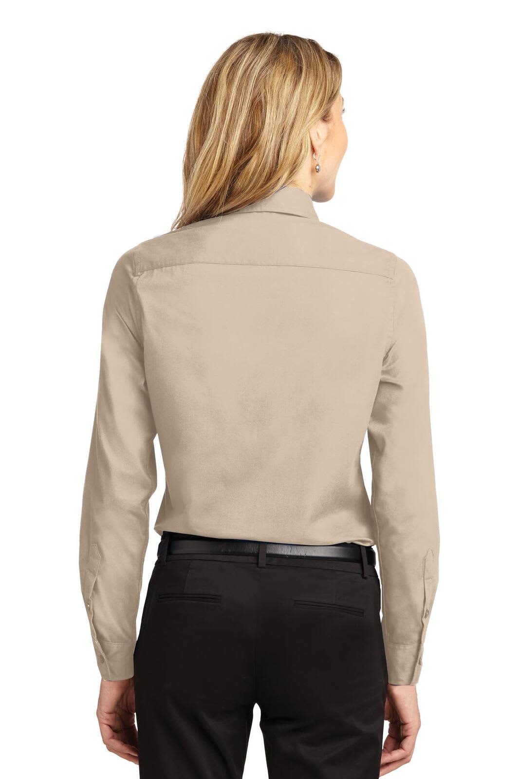 A long sleeve, button-up shirt in a light beige colour, featuring a plain back design.