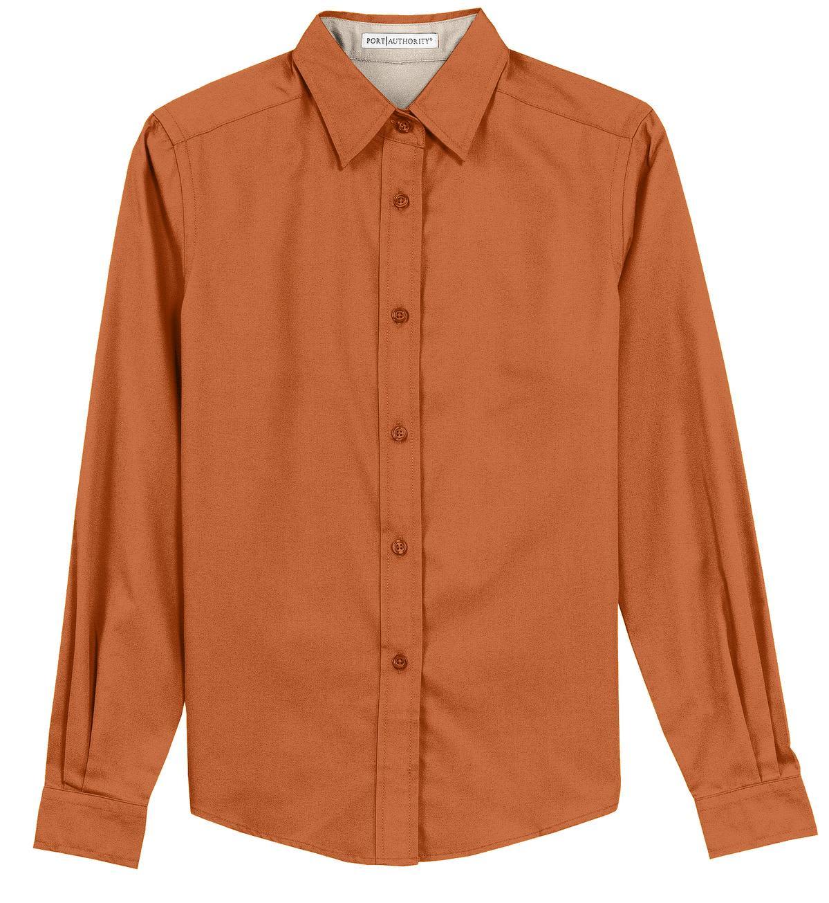 An orange long sleeve button-up shirt with a collar and a logo.