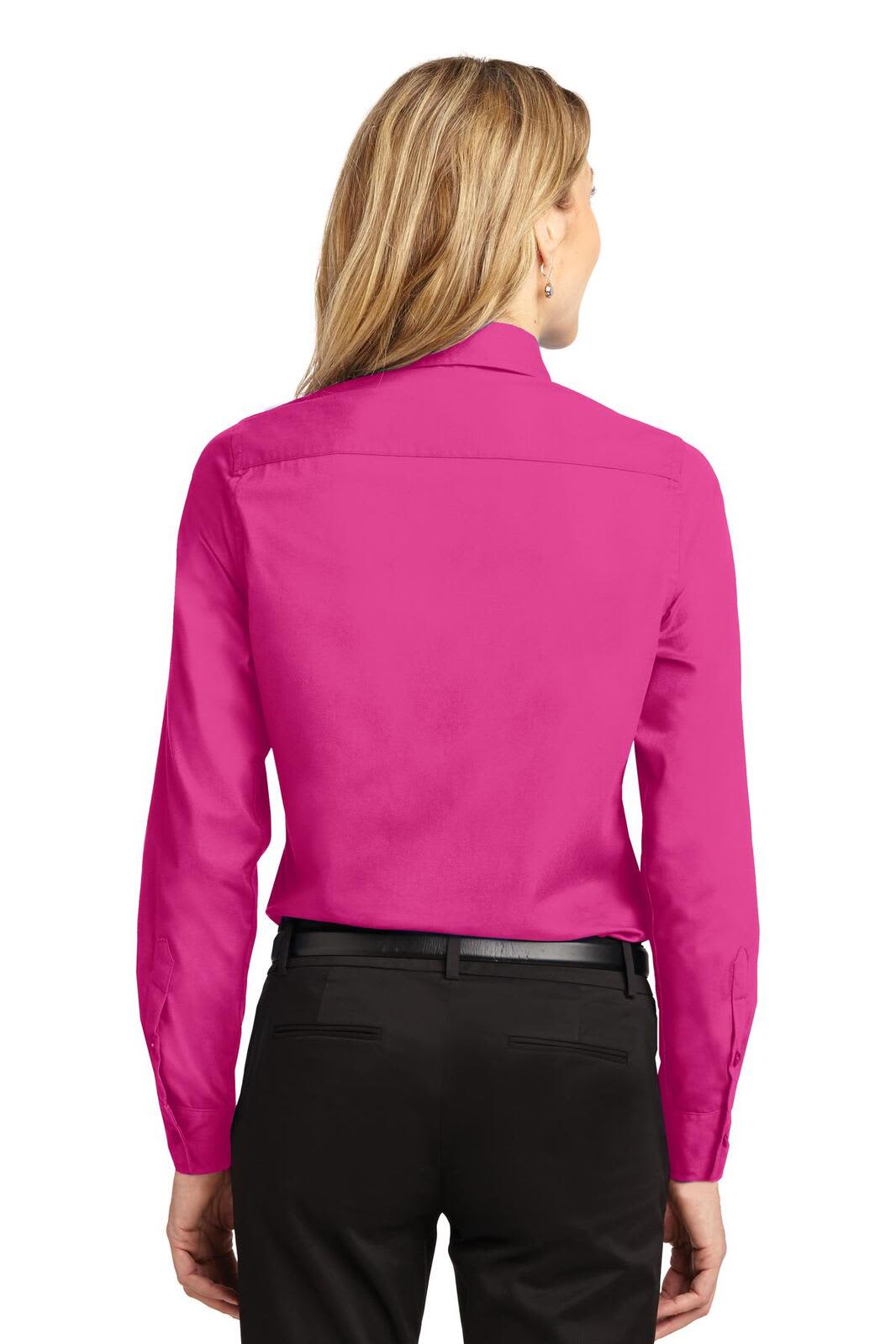 A back view of a pink long sleeve button-up shirt with a collar, featuring a logo.