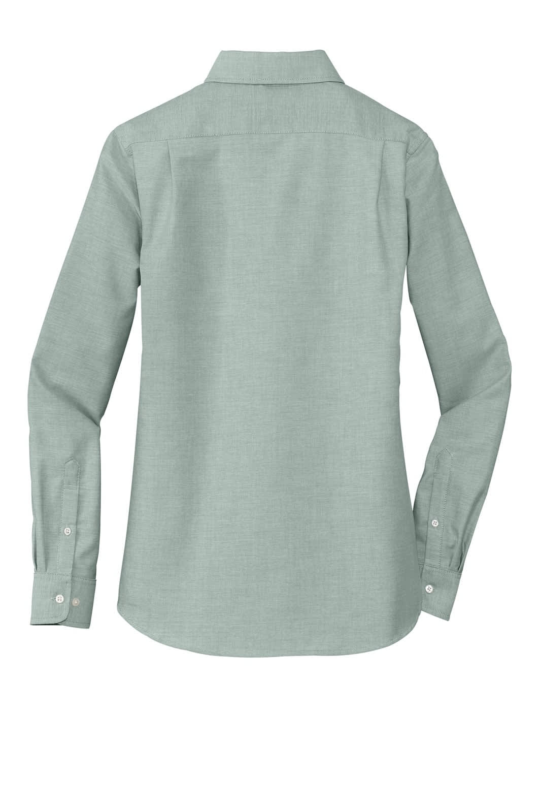 A light green, long-sleeved button-up shirt with a collared neckline and a logo on the back.