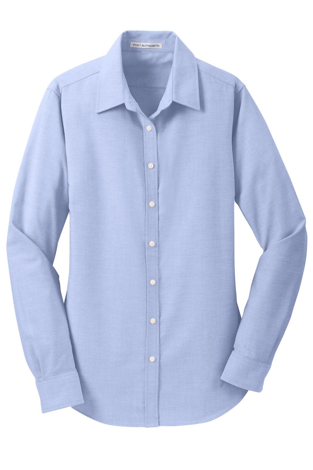 A light blue button-up shirt featuring long sleeves and a collar, with a branding logo on the fabric.
