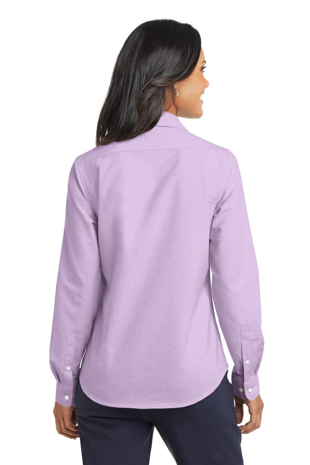 A lilac button-up shirt with long sleeves, featuring a collar and a logo on the back.
