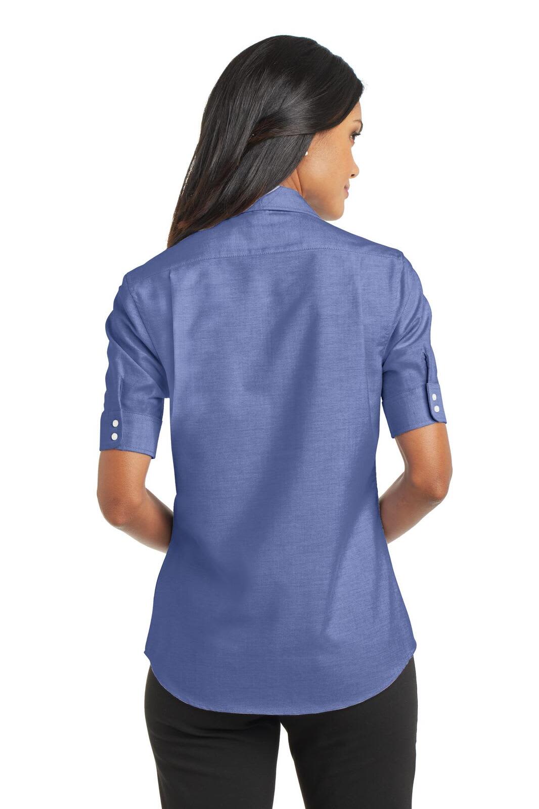 A blue short sleeve women's button-up shirt with a back view, featuring a collar and a logo detail.
