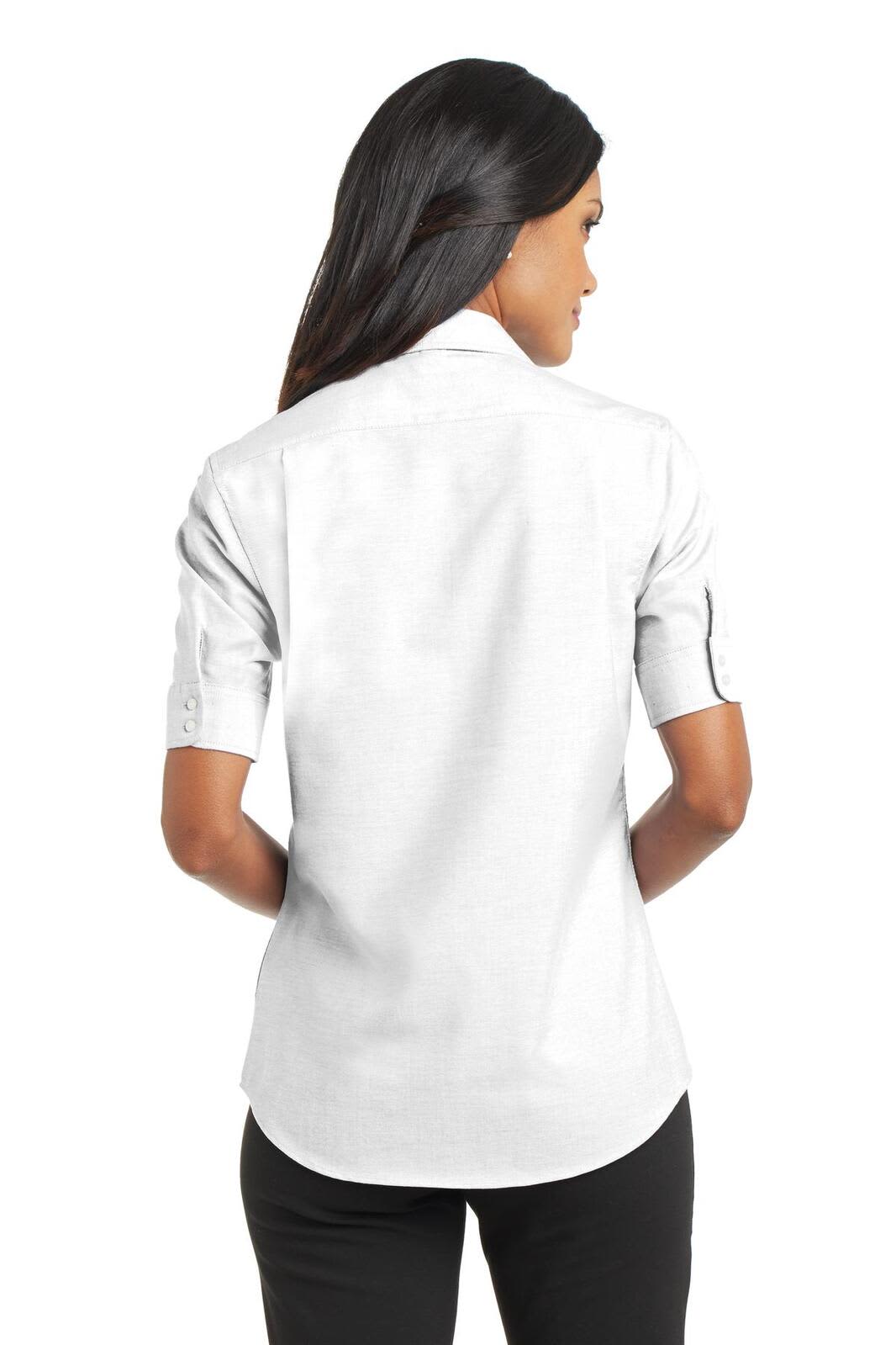 A back view of a light grey button-up shirt with short sleeves and rolled cuffs, featuring a logo.