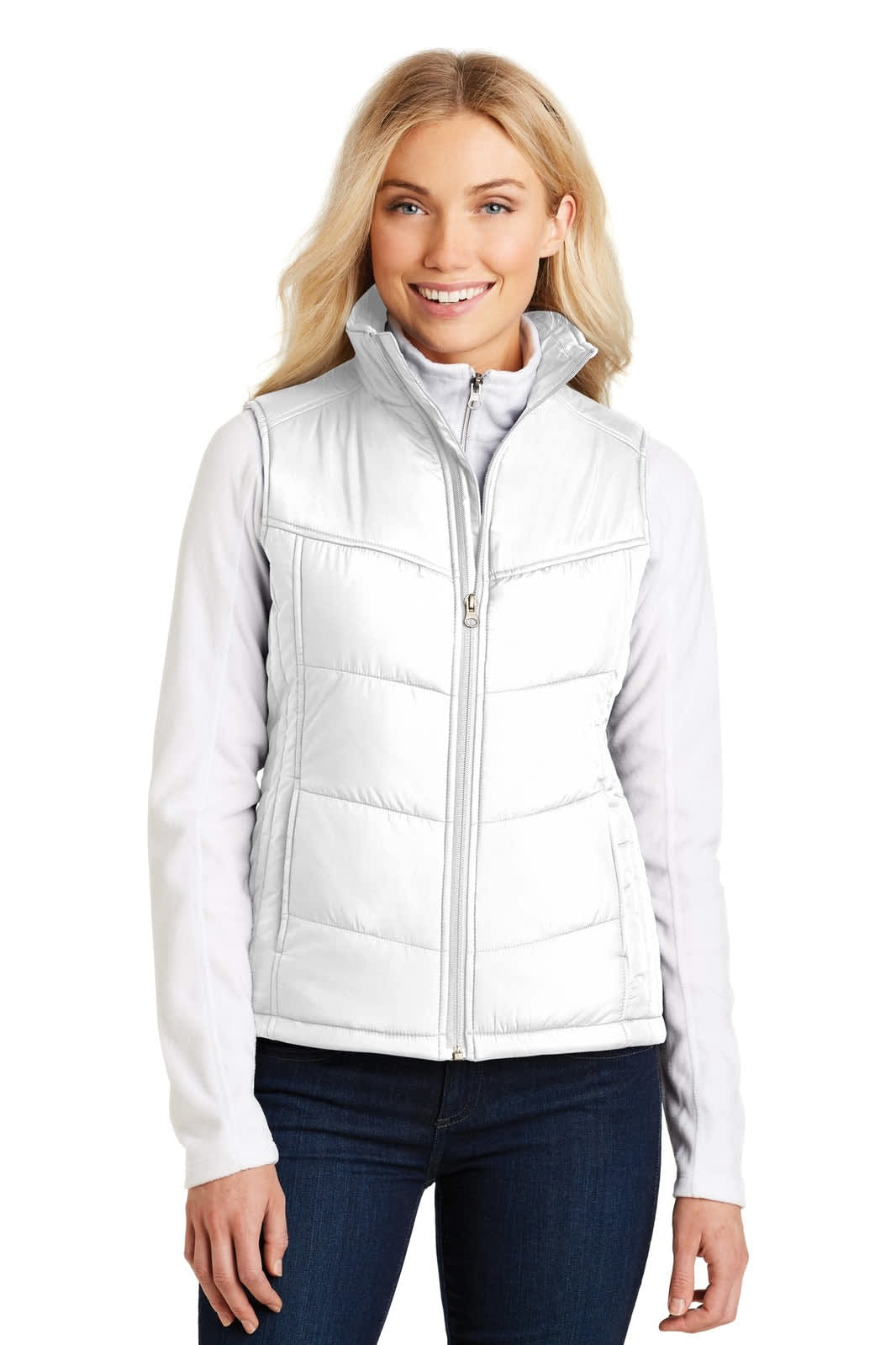 A white puffy vest with a zippered front and high collar, paired with a long-sleeve top.