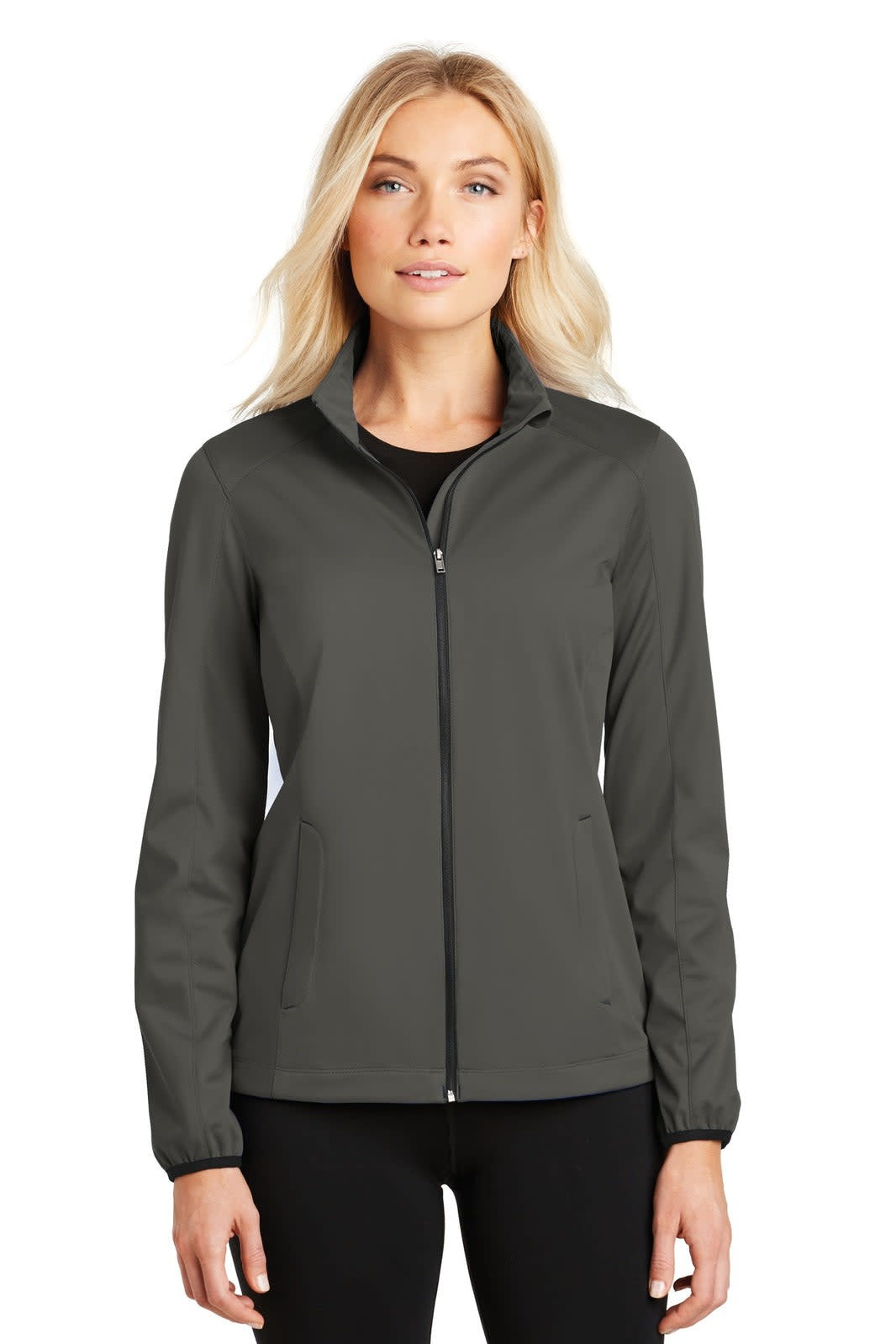 A soft shell jacket in dark grey for ladies, featuring a zip front and two side pockets, with branding visible.