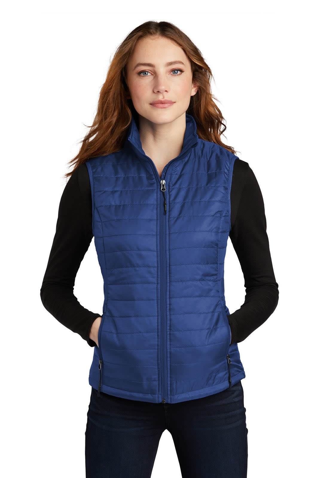 A navy blue packable puffy vest featuring a front zip and side pockets, worn over a black top.