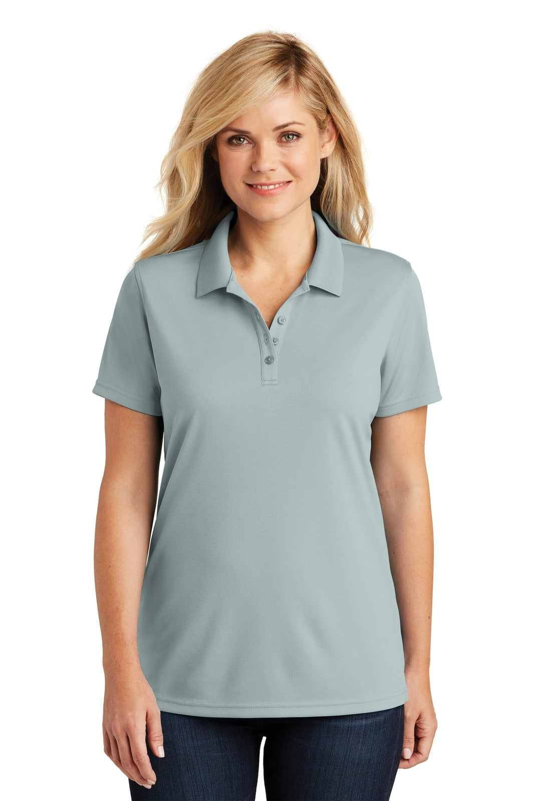 A light blue women's polo shirt with a collar and buttons, featuring a logo on the chest area.