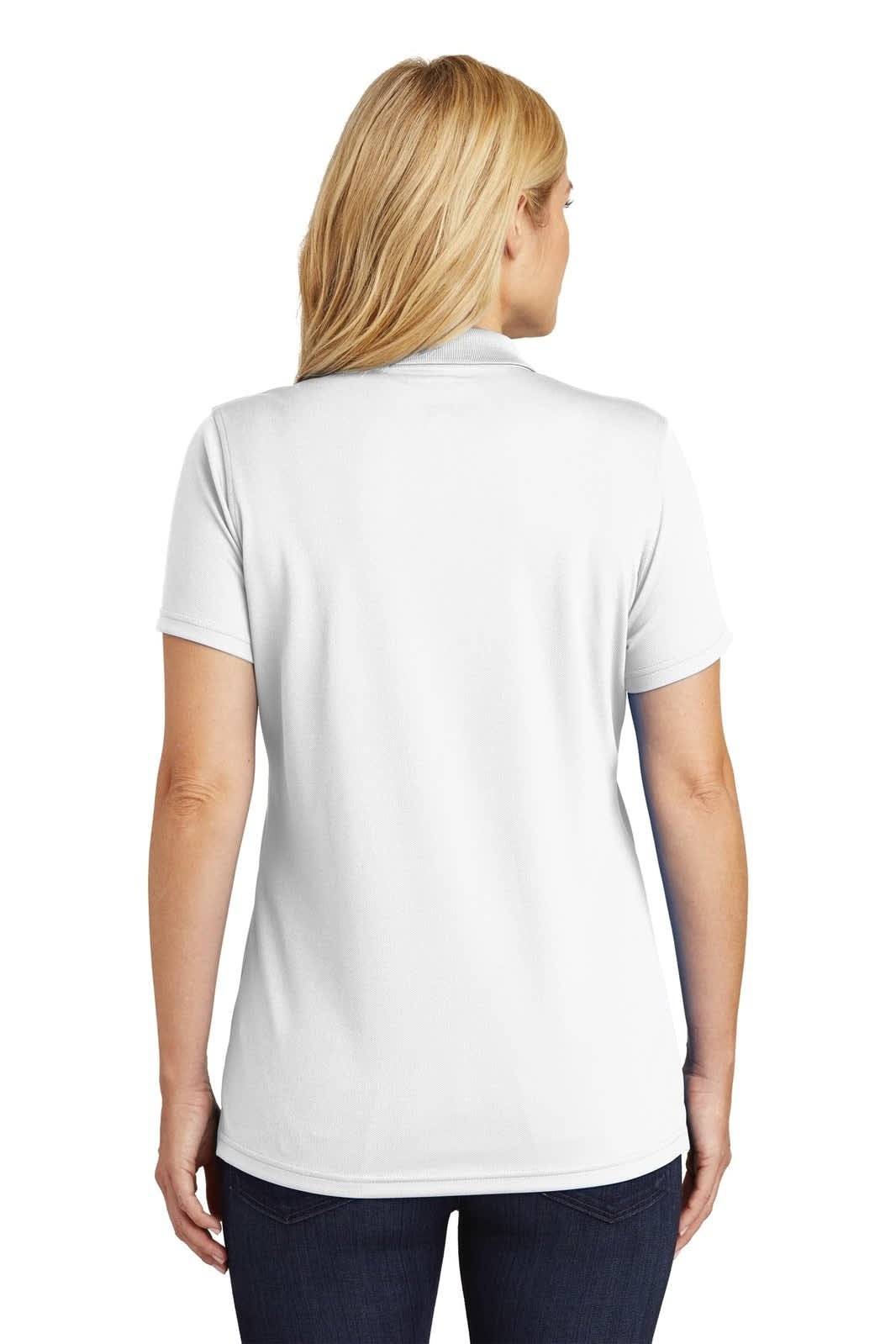 A woman is wearing a white polo shirt, featuring a micro-mesh design and a branding logo.