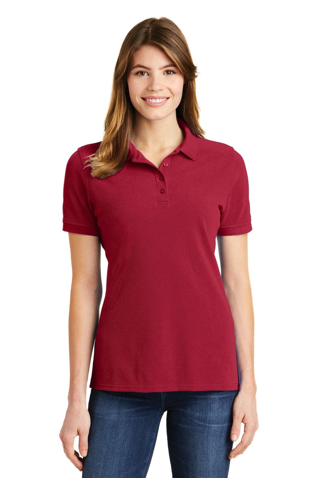 A woman wearing a red polo shirt with a collar and short sleeves, paired with blue jeans. The shirt has a logo.