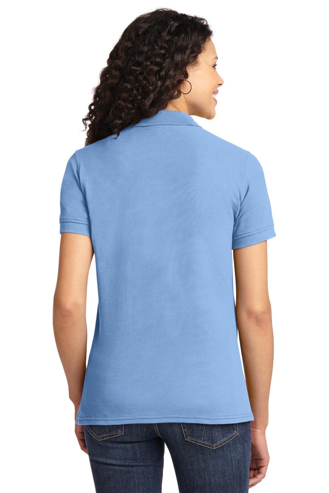 A light blue polo shirt with short sleeves, featuring a back view of a woman wearing it. It has a logo on the chest.