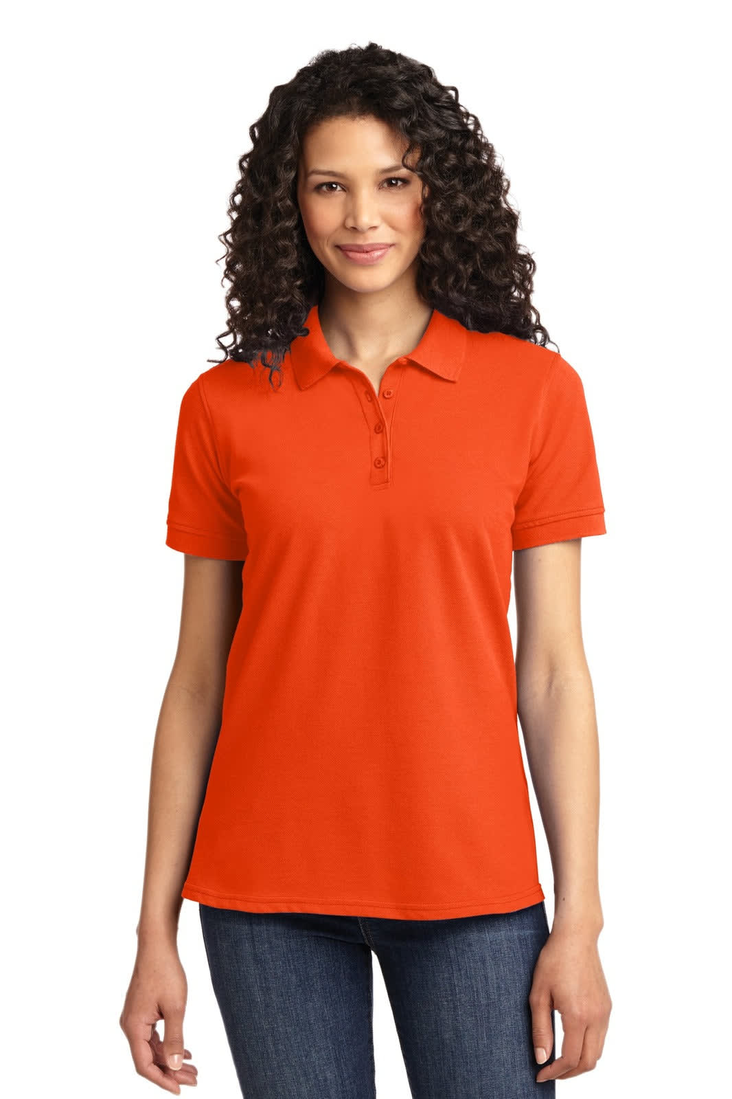 A woman wearing an orange polo shirt with a collar, featuring a logo. The shirt has a classic fit and short sleeves.