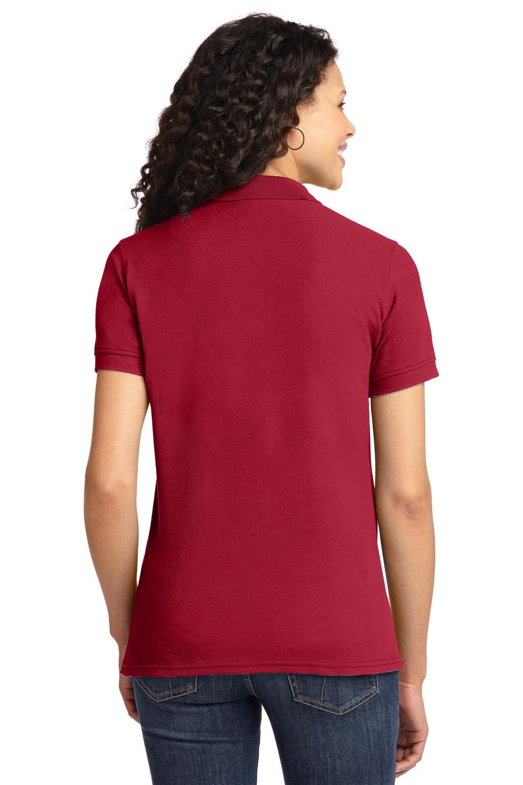 A maroon polo shirt featuring a short sleeve design with a back view and a logo on the collar.