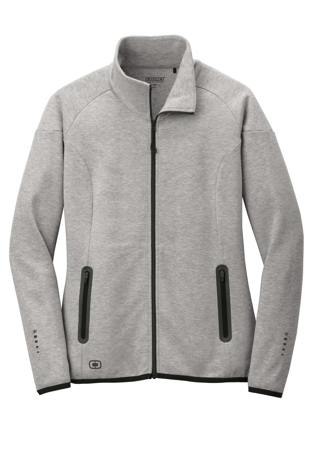 A grey ladies' jacket with a high collar, zip front, and two side pockets. Features details and a logo.