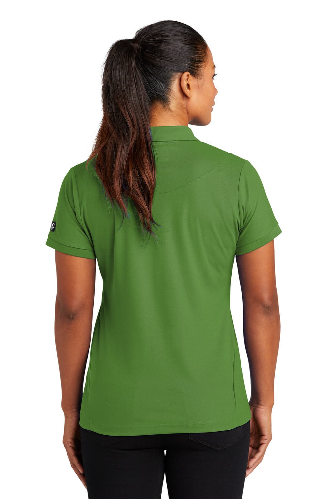 A green polo shirt with a fitted design, featuring a logo on one sleeve. The back view showcases its sporty style.