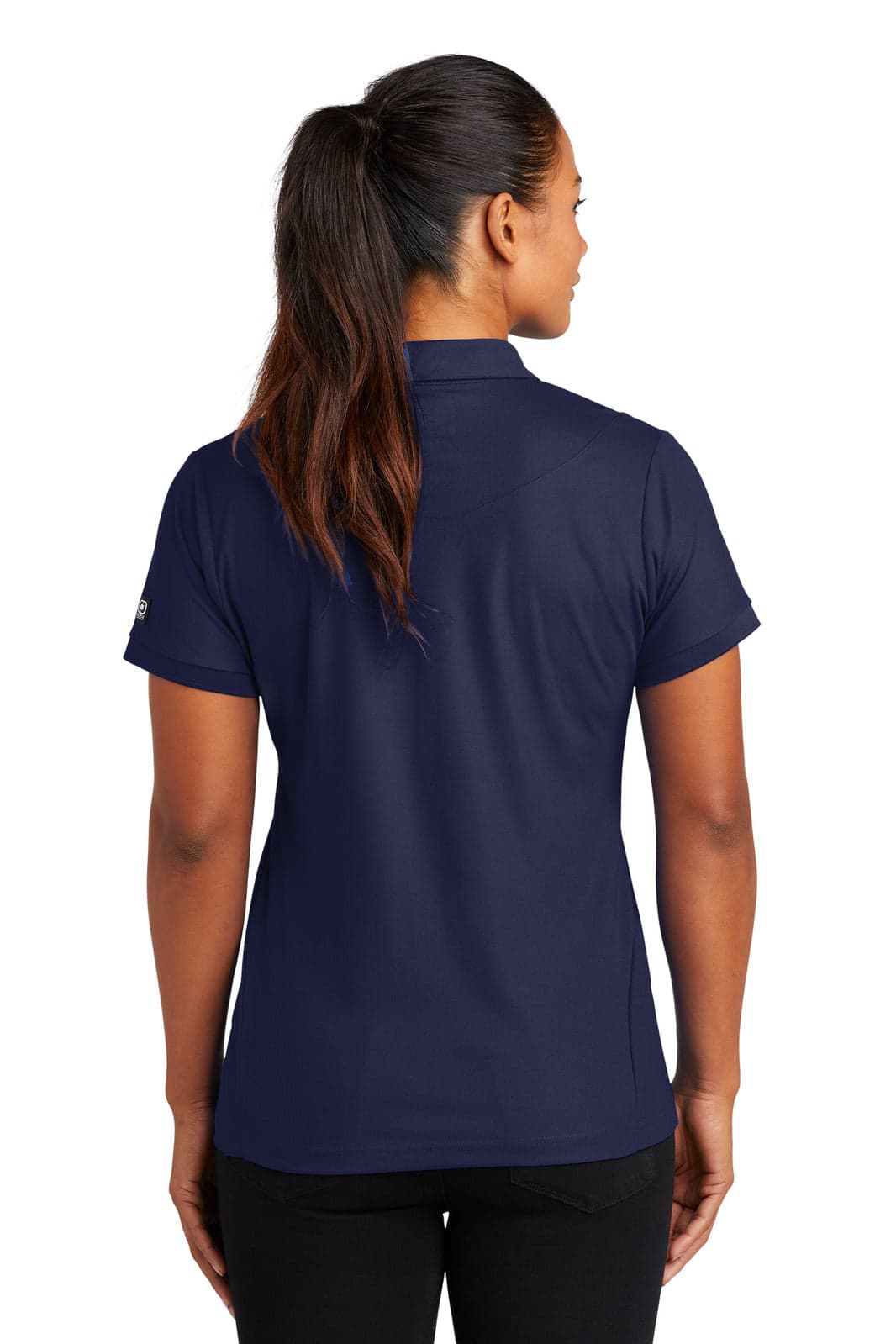 A navy blue polo shirt with short sleeves and a logo on the sleeve, viewed from the back.