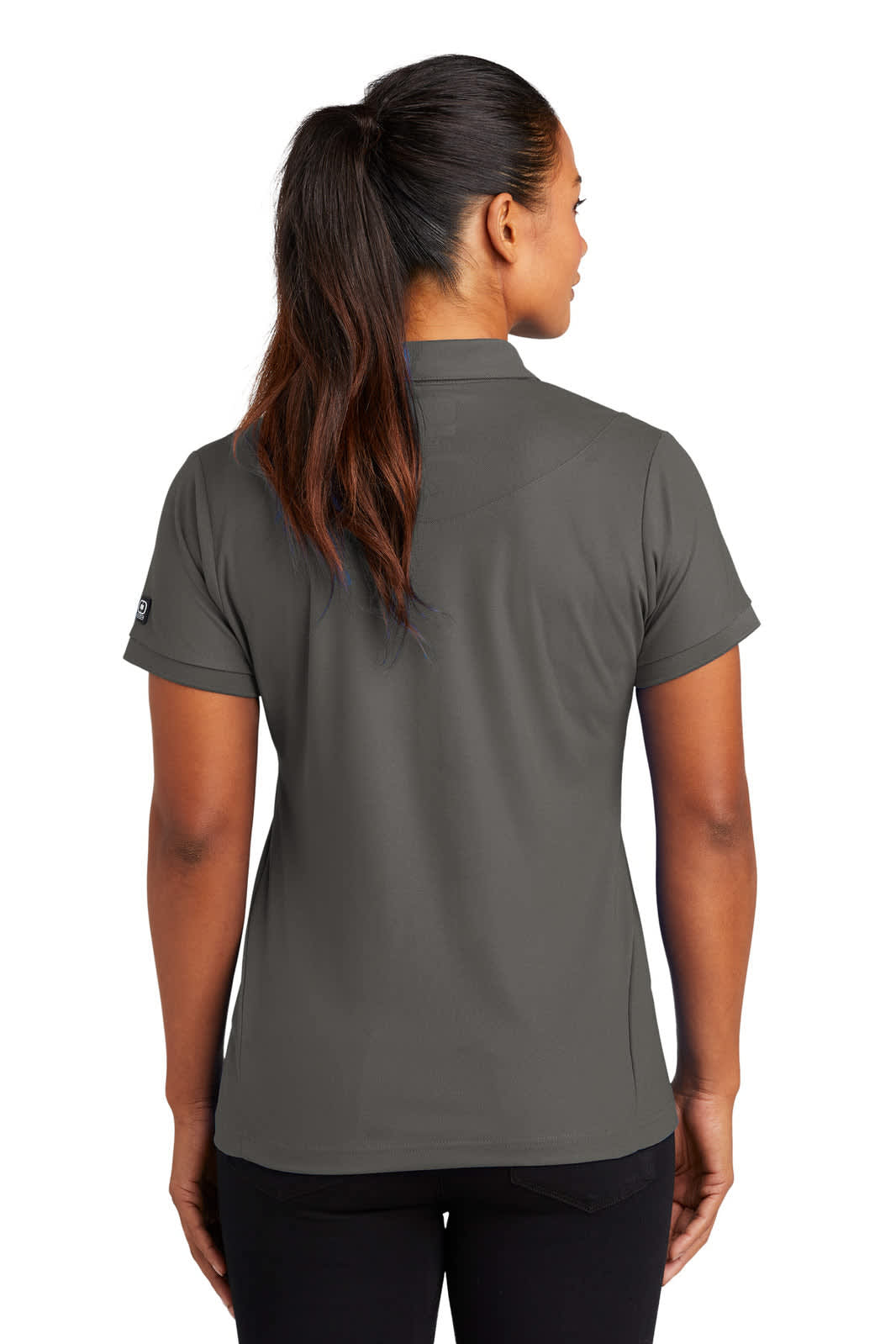 A grey polo shirt with a stylish fit, featuring a logo on the side, shown from the back.