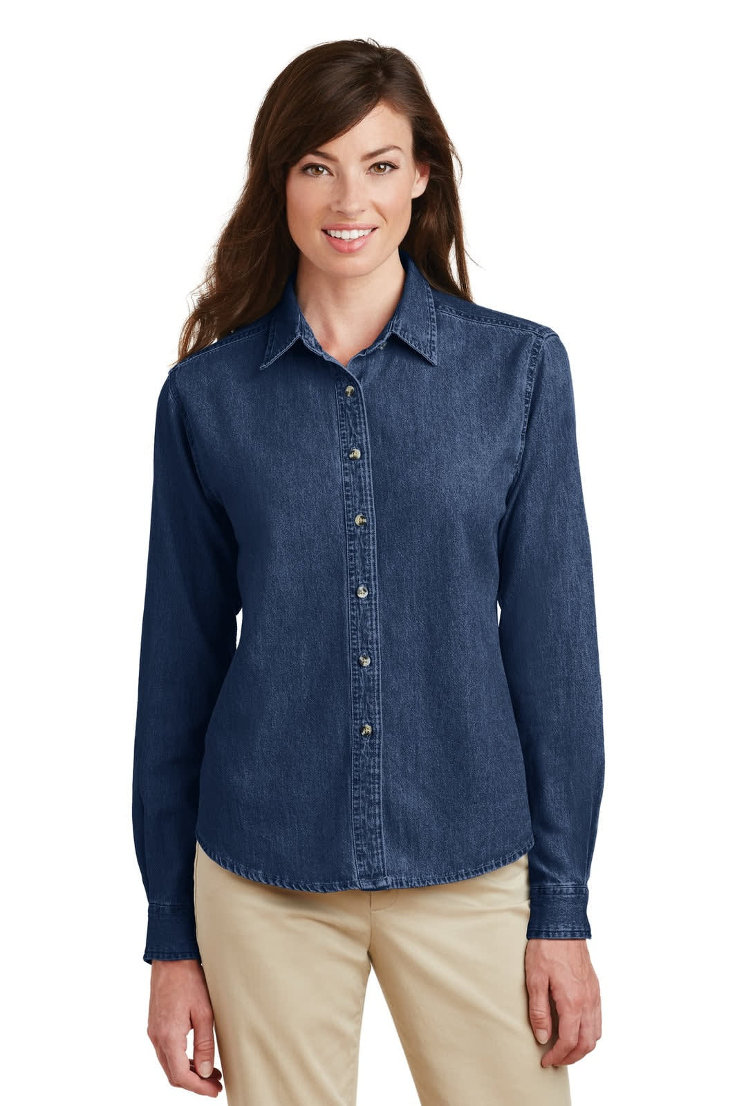 A denim shirt in a blue hue, featuring long sleeves, a button-up design, and a collar. The model is smiling.
