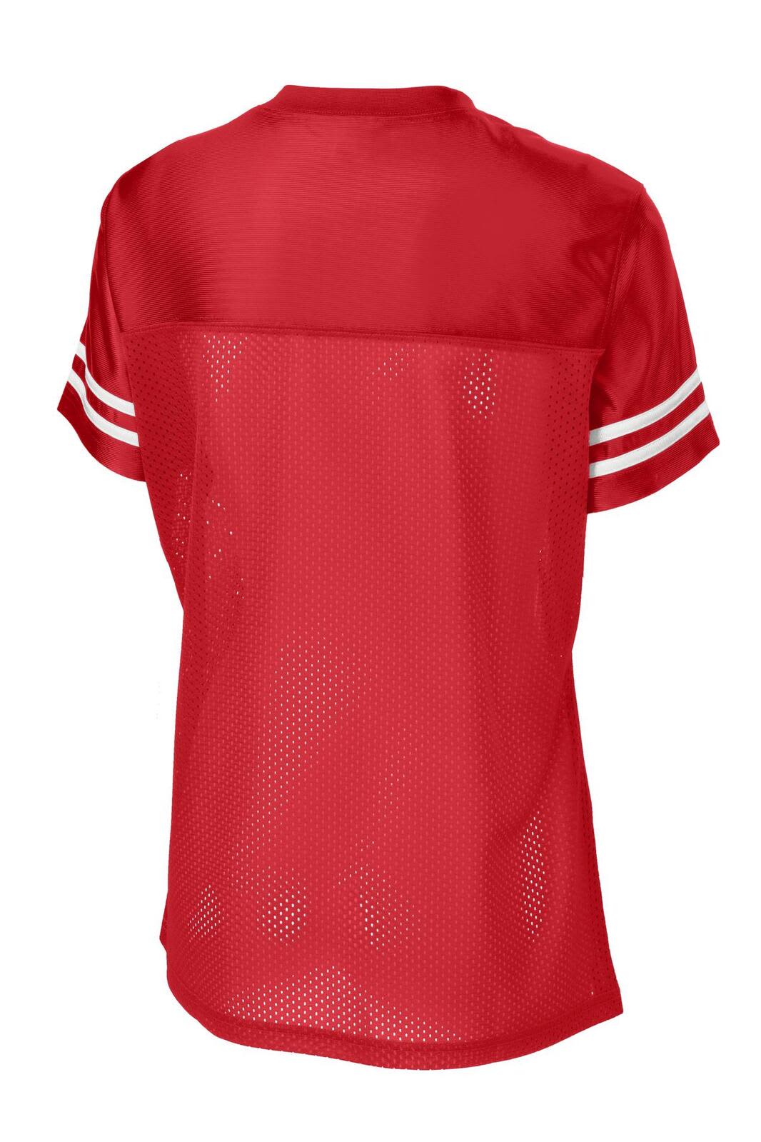A red Sport-Tek ladies jersey featuring a mesh back and white stripes on the sleeves. It has a logo on it.