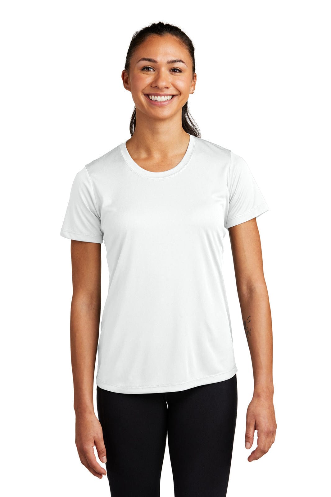 A white t-shirt designed for women, featuring a logo, with a relaxed fit and short sleeves.
