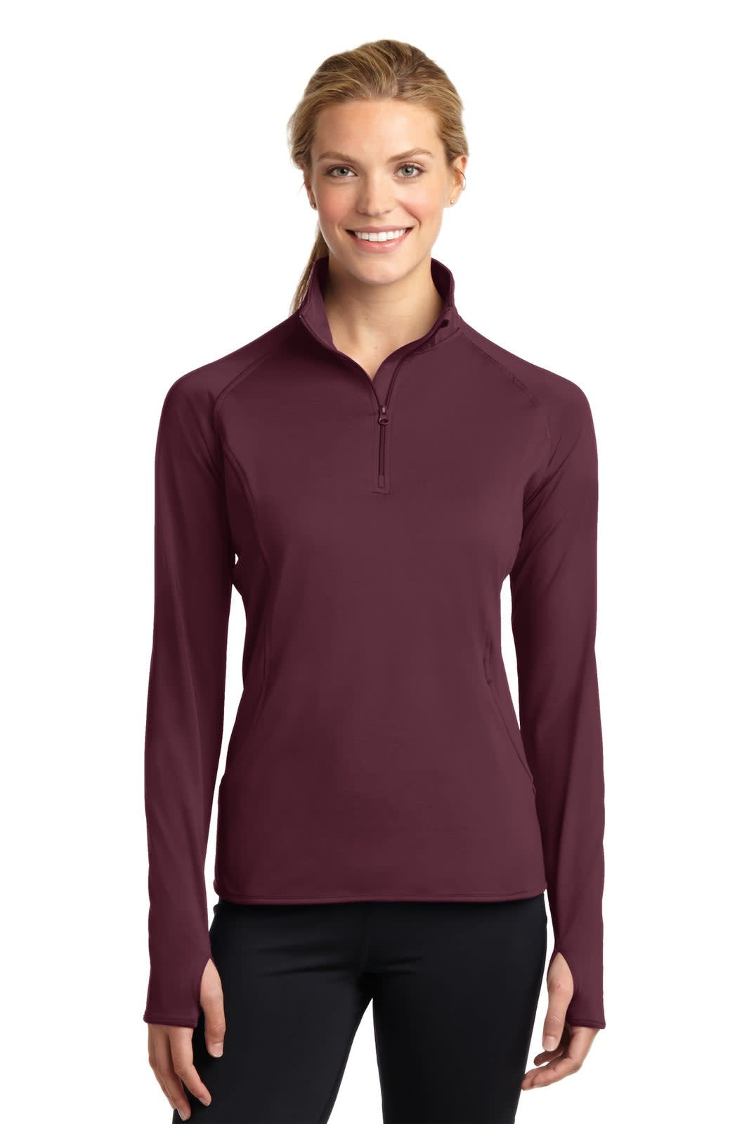 A maroon long-sleeve pullover with a 1/2 zip and a fitted design, featuring a logo on the chest.