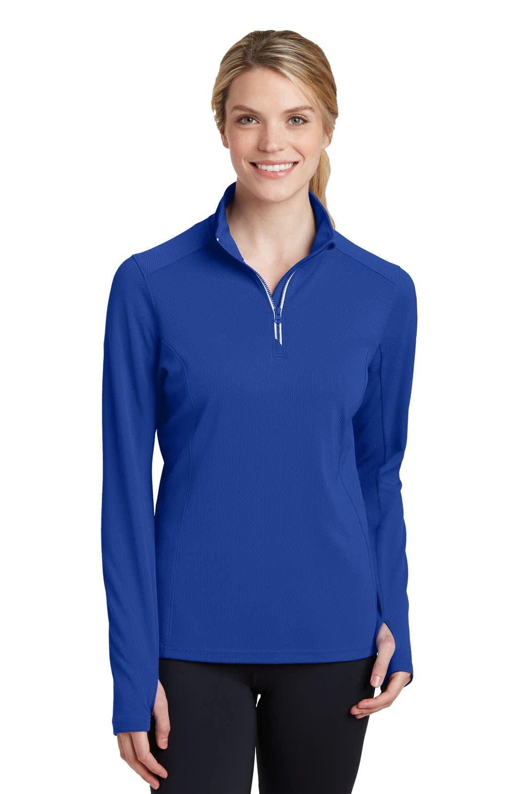A woman wearing a bright blue Sport-Tek Ladies Sport-Wick Textured 1/4-Zip Pullover. The pullover features a logo.