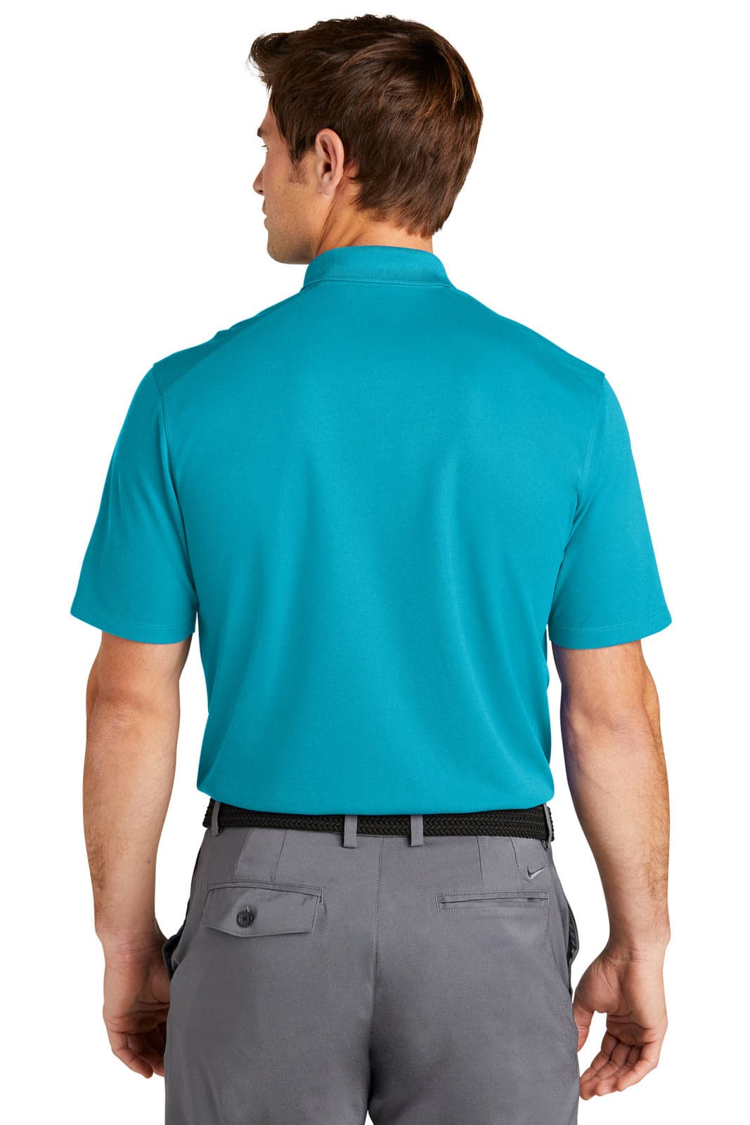 A man is wearing a turquoise Nike Dri-FIT Micro Pique 2.0 Polo shirt, viewed from the back. The shirt features a collar.