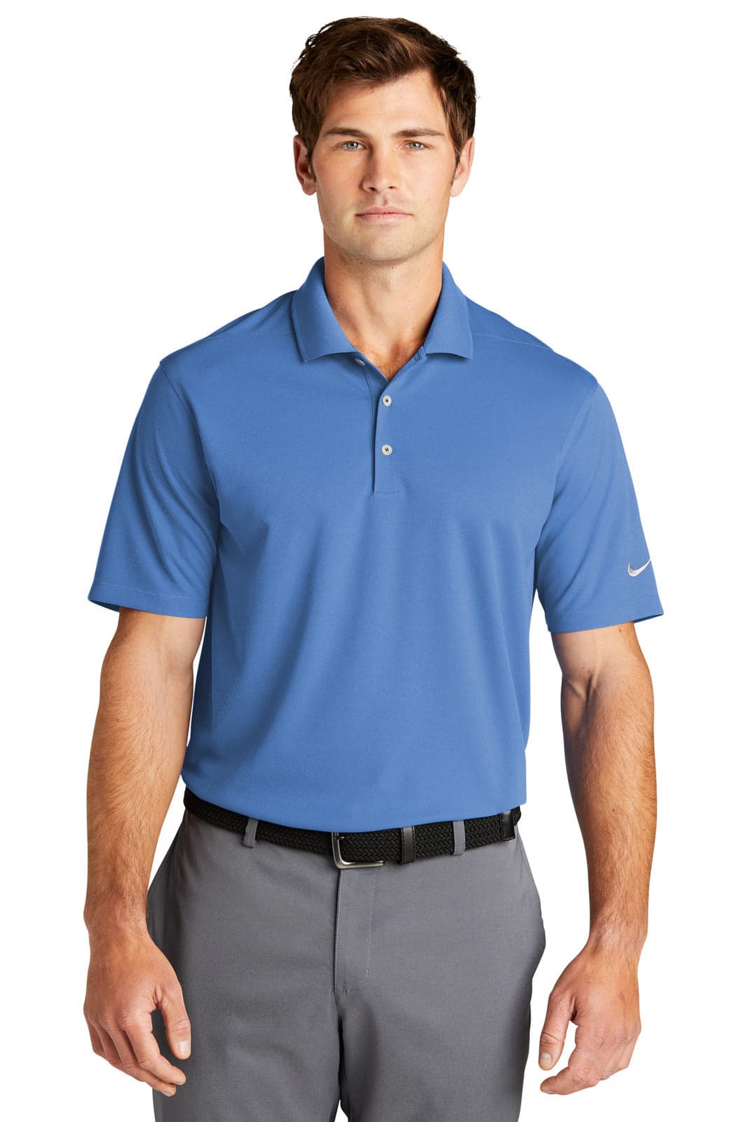 A blue Nike Dri-FIT Micro Pique 2.0 Polo shirt on a model, featuring a logo on the sleeve.