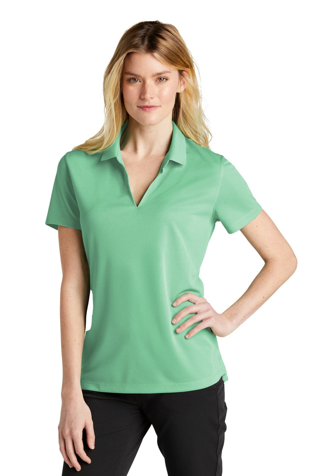 A green Nike Dri-FIT Micro Pique 2.0 polo shirt for ladies, featuring a classic polo design and a logo.