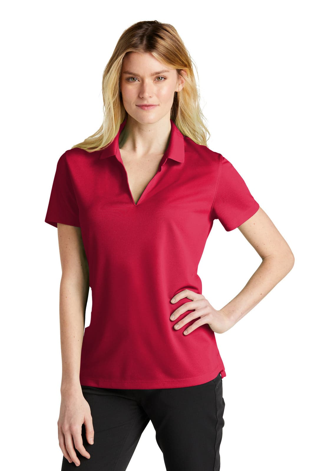 A red Nike ladies' Dri-FIT micro pique 2.0 polo shirt on a model, featuring a collar and a fitted design.