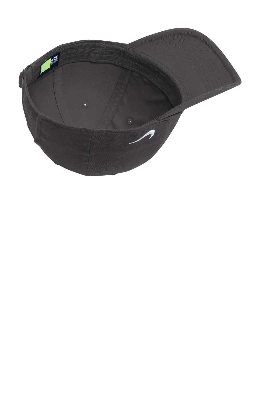 A grey Nike Heritage 86 Cap with a curved brim and an interior view showcasing its lining and structure.