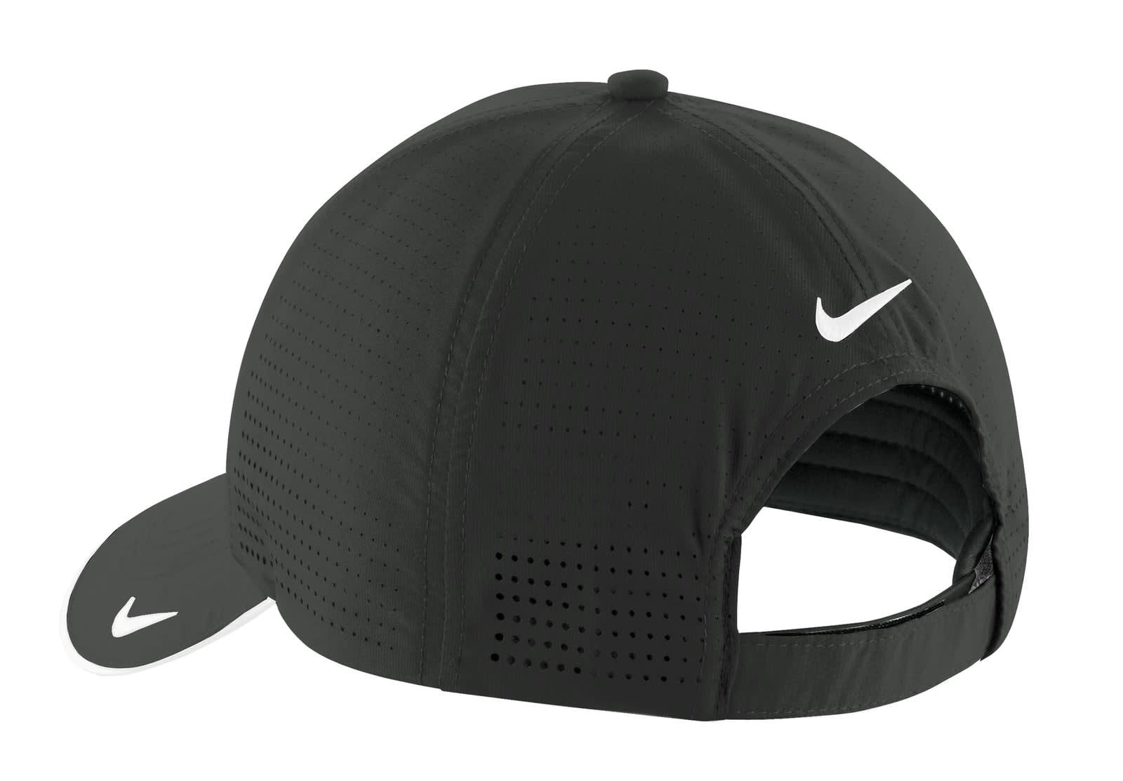 A black cap with perforated design and a branded logo, featuring a curved peak and adjustable strap at the back.