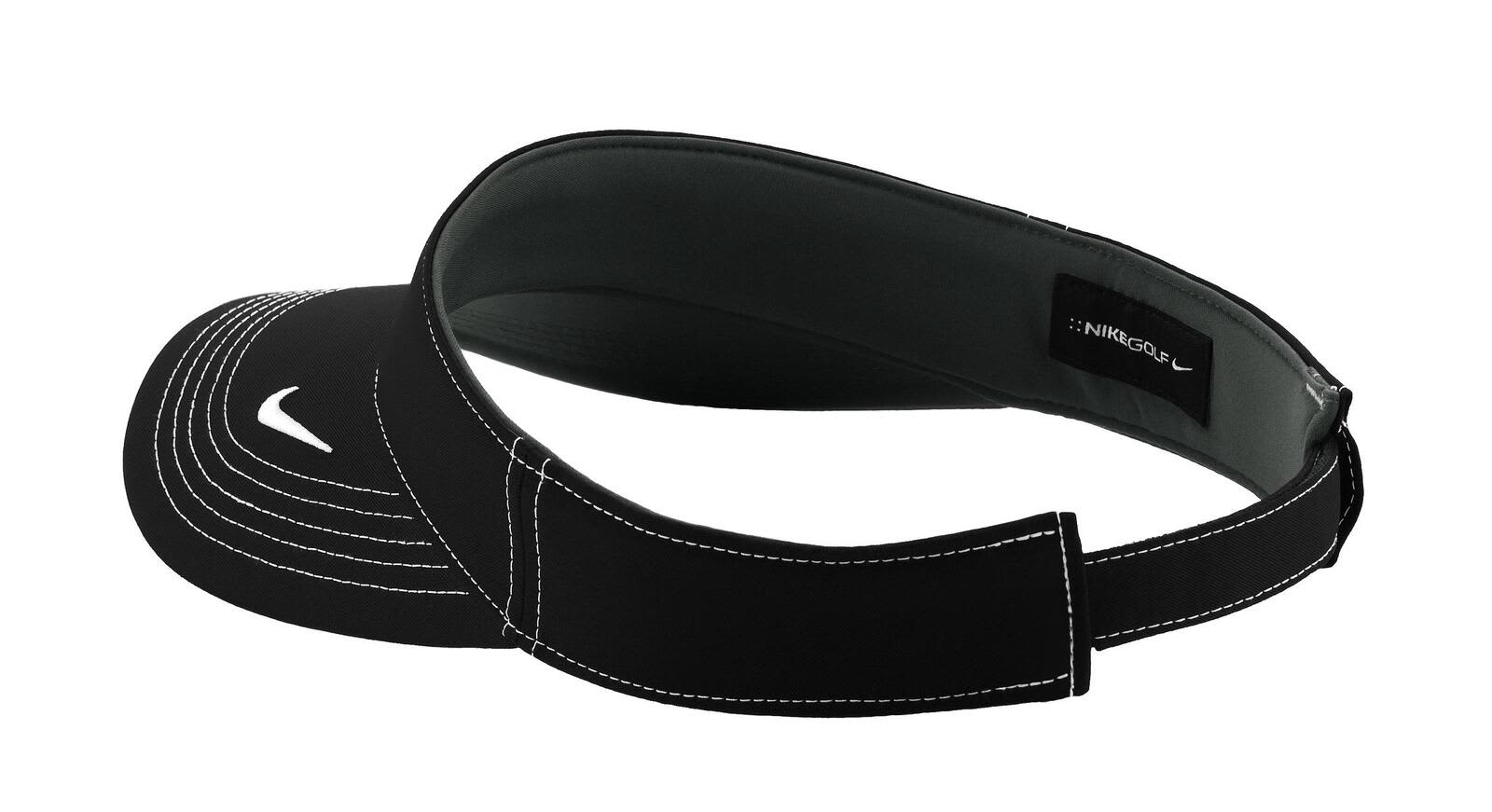 A black Nike Dri-FIT Swoosh visor featuring white stitching and a logo, designed for headwear.