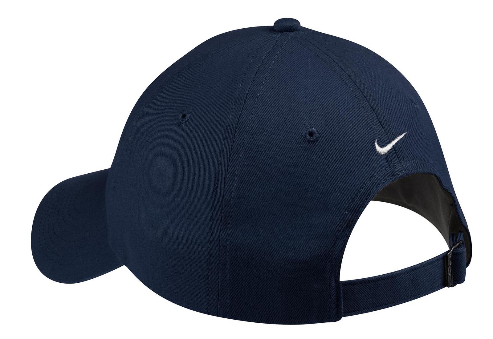 A navy blue Nike unstructured twill cap featuring a logo, designed for casual wear.