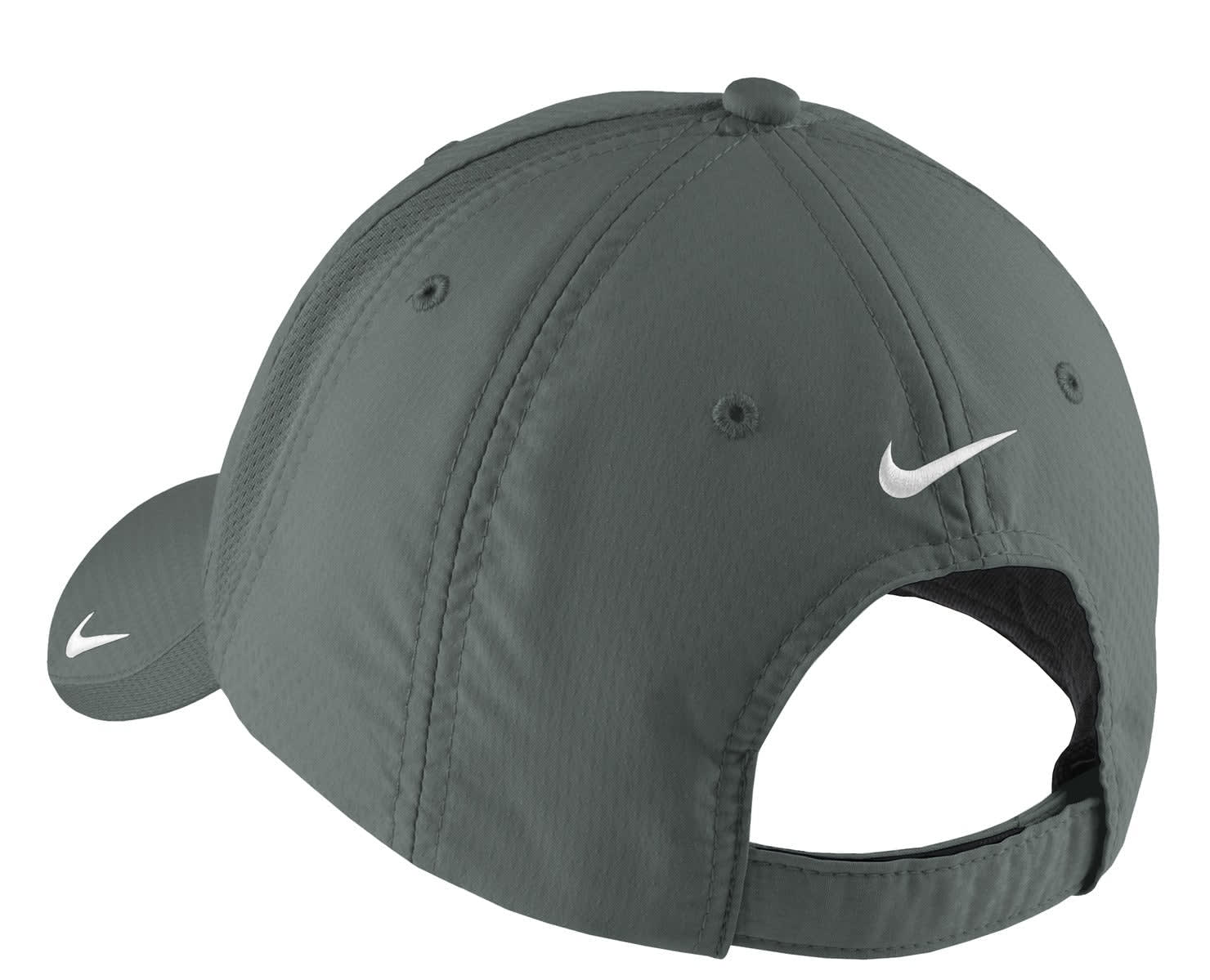 A grey Nike cap featuring a curved brim and adjustable strap at the back, with a visible logo.