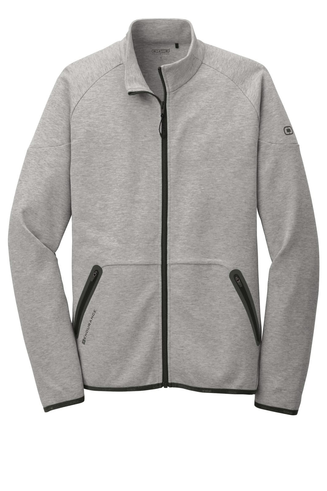 A grey track jacket with a front zipper, featuring side pockets and a small logo on the sleeve.