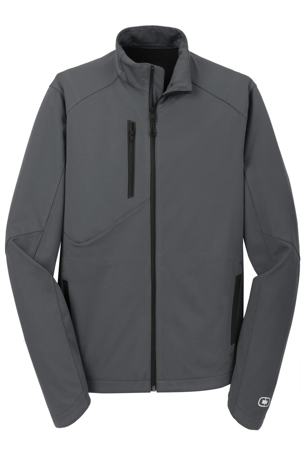 A grey OGIO ENDURANCE Crux Soft Shell jacket featuring zippered pockets and a logo on the sleeve.